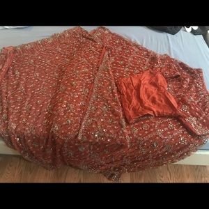 Indian wedding lehenga. Heavy stone work. Rust